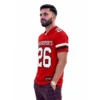 Red football uniform with custom team design and player number 26