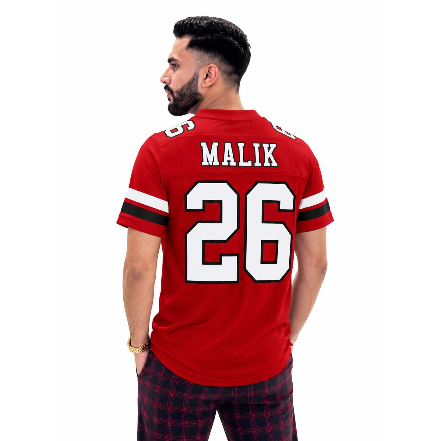 Red football uniform with custom team design and player number 26